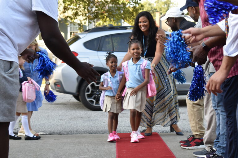 Heritage Academy students walk the red carpet to celebrate the 1st day